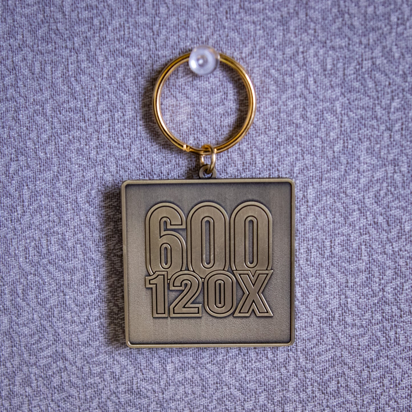 600 120X Keychain